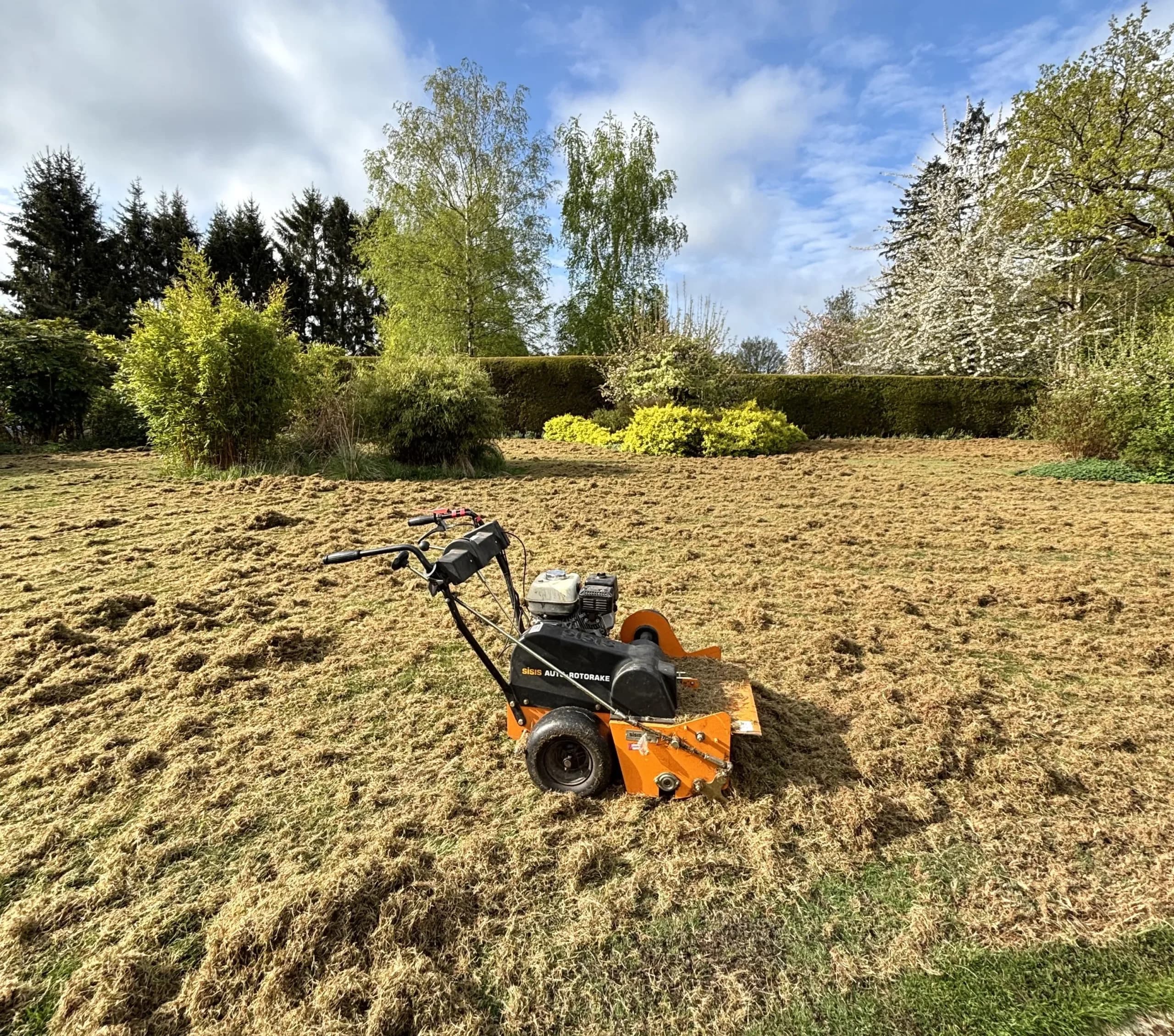 Image of scarifier on a lawn that has been scarified